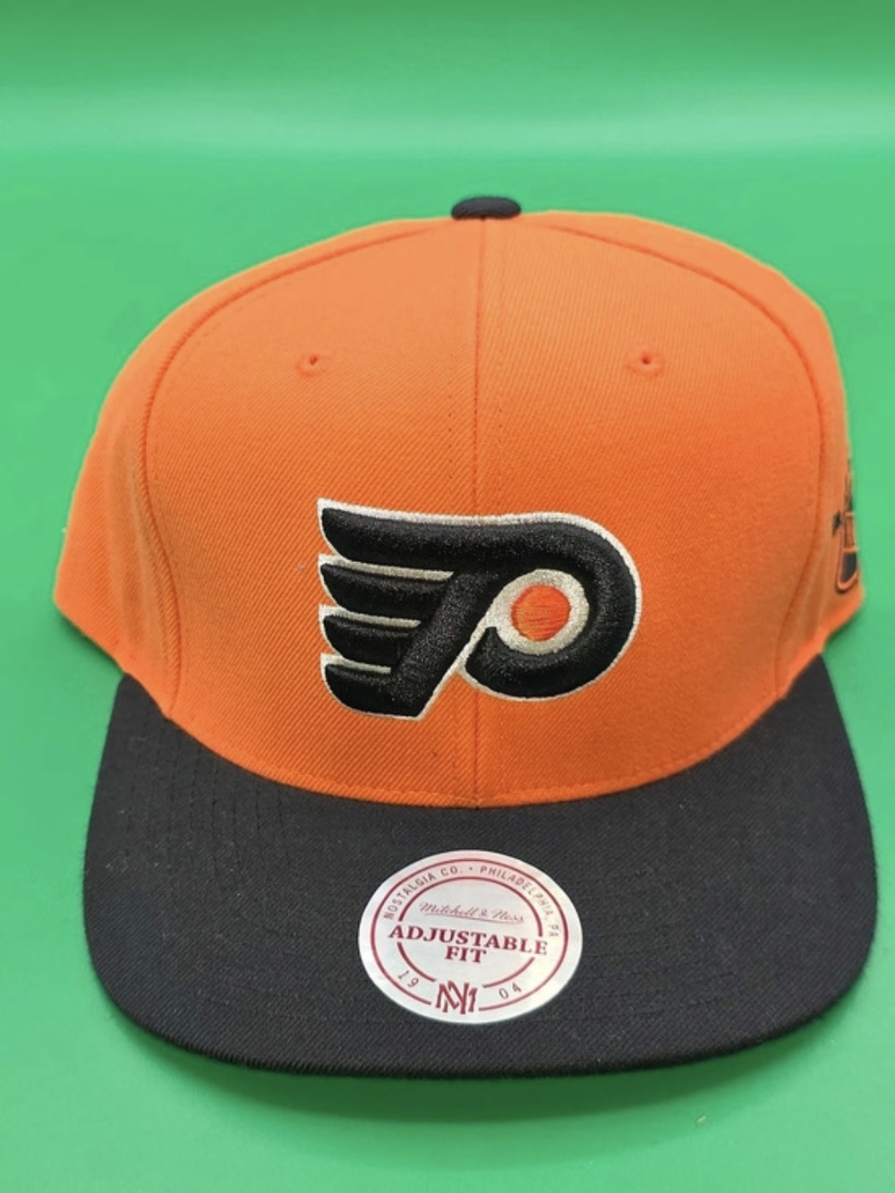 Mitchell & Ness NHL Philadelphia Flyers Vintage Hockey snapback in Orange &Black